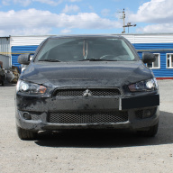 Mitsubishi Lanser X установка билинз